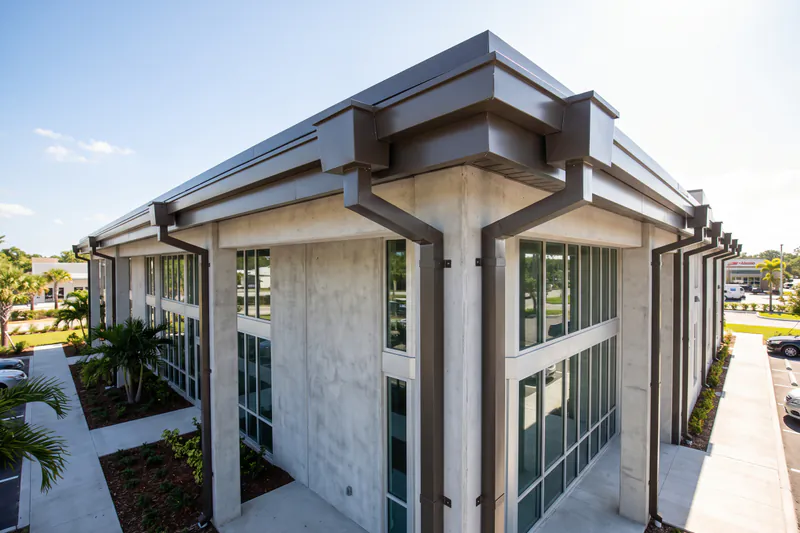 Heavy 7-inch commercial box gutter and industrial downspout installation in Haines City FL