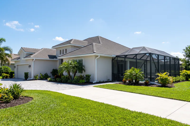 Complete residential seamless gutter system with pool enclosure and lanai drainage in Haines City FL
